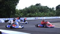 Foto: Pebalap gokart listrik melaju di Sirkuit ITS Surabaya dalam gelaran PLN ICE 2025.