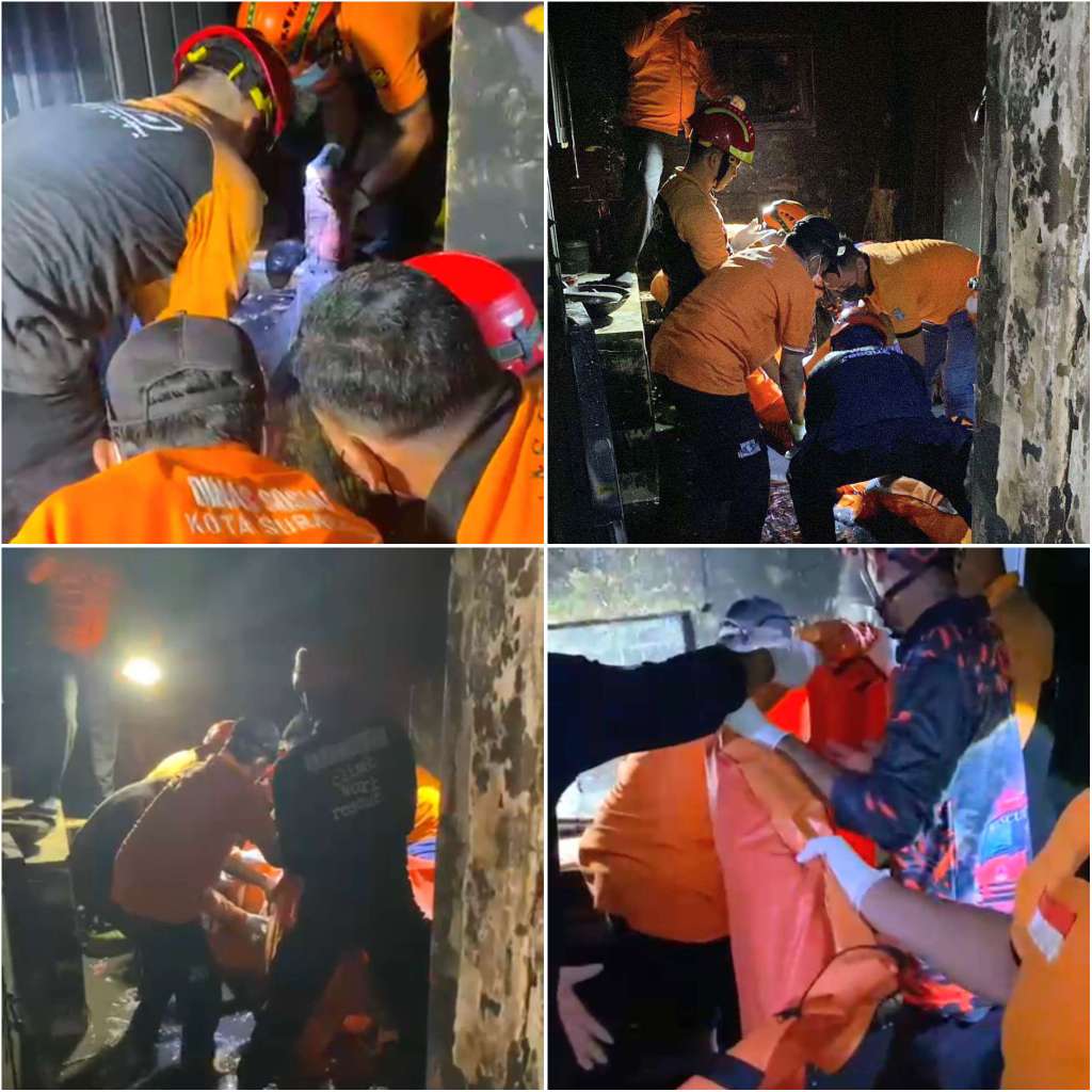 Foto: Petugas DPKP dan BPBD Surabaya melakukan pemadaman kebakaran rumah dua lantai di Banyu Urip Kidul Sawahan Surabaya yang menewaskan dua orang.