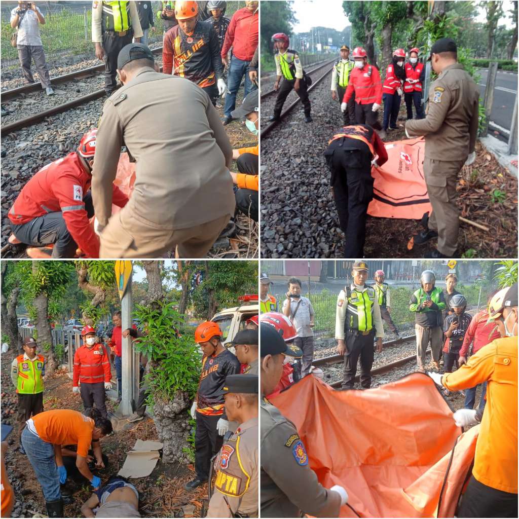 Foto: Petugas gabungan mengevakuasi korban kecelakaan KA Penataran di perlintasan rel Siwalankerto Surabaya.
