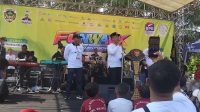 Foto: Ketua DPD PERBARINDO Jawa Timur bersama Bupati Madiun dan jajaran saat menghadiri peringatan Hari BPR Nasional 2026 di Alun-Alun Reksogati Caruban Kabupaten Madiun.
