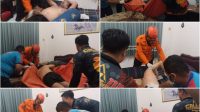 Foto: Petugas gabungan melakukan evakuasi jenazah seorang pria yang ditemukan meninggal dunia di rumahnya di kawasan Wonorejo, Rungkut, Surabaya.
