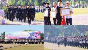 Foto: Kapolres Madiun AKBP Kemas Indra Natanegara menyerahkan piagam penghargaan pada peringatan Hari Bhayangkara ke-80 di Alun-Alun Reksogati Caruban.