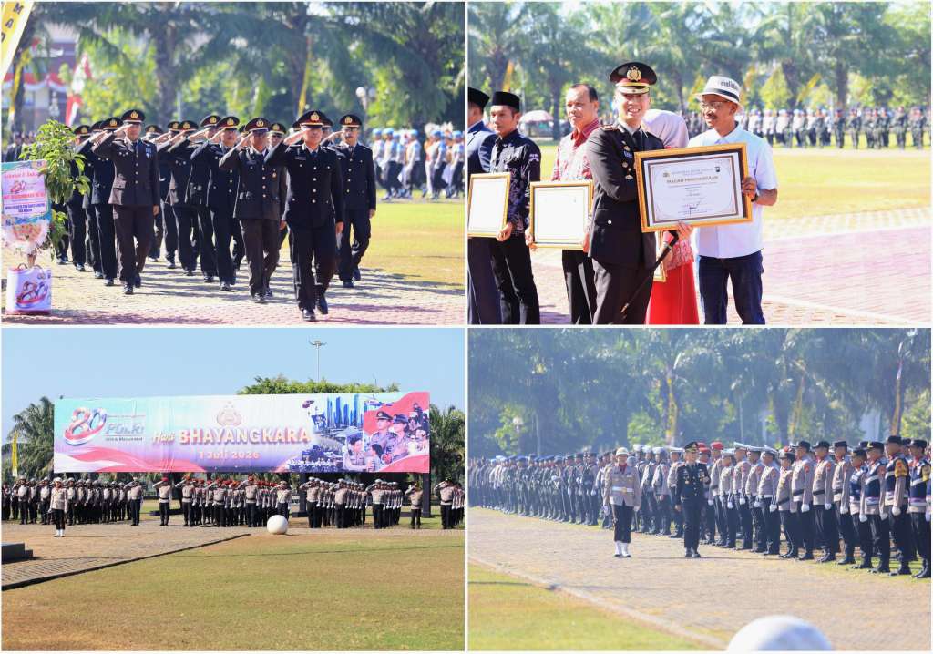 Foto: Kapolres Madiun AKBP Kemas Indra Natanegara menyerahkan piagam penghargaan pada peringatan Hari Bhayangkara ke-80 di Alun-Alun Reksogati Caruban.