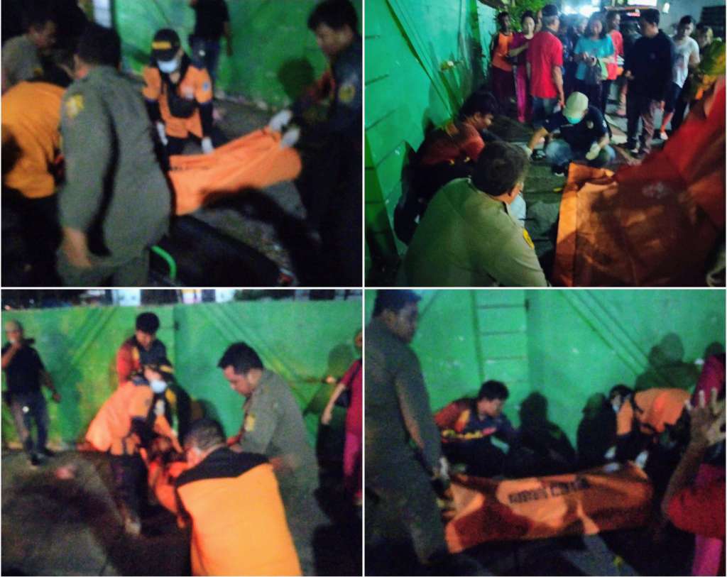 Foto: Petugas BPBD, kepolisian, dan INAFIS melakukan penanganan terhadap korban meninggal mendadak di Jalan Pacar Kembang V Baru, Surabaya.